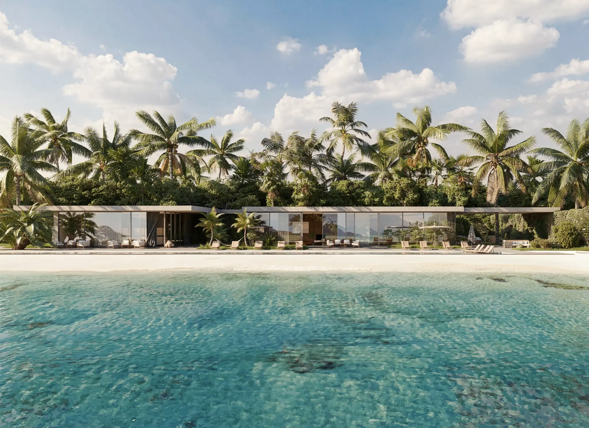 Low contemporary villa facing a tropical beach and clear water